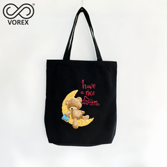 "Moonlight Dreams" Bear Sleeping on Crescent Pillow - VOREX 12oz Canvas Tote Bag - Lightweight & Comfortable for Everyday Use (Beige & Black)